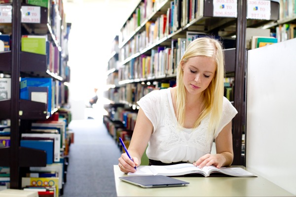 Avondale College of Higher Education student studying in Avondale Libraries (Lake Macquarie campus)