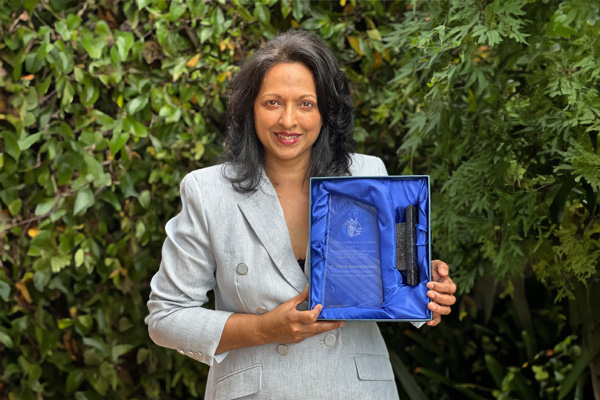 Drene Somasundram with her Woman of the Year award